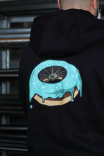 Lade das Bild in den Galerie-Viewer, .oimls - türkis donut hoodie black
